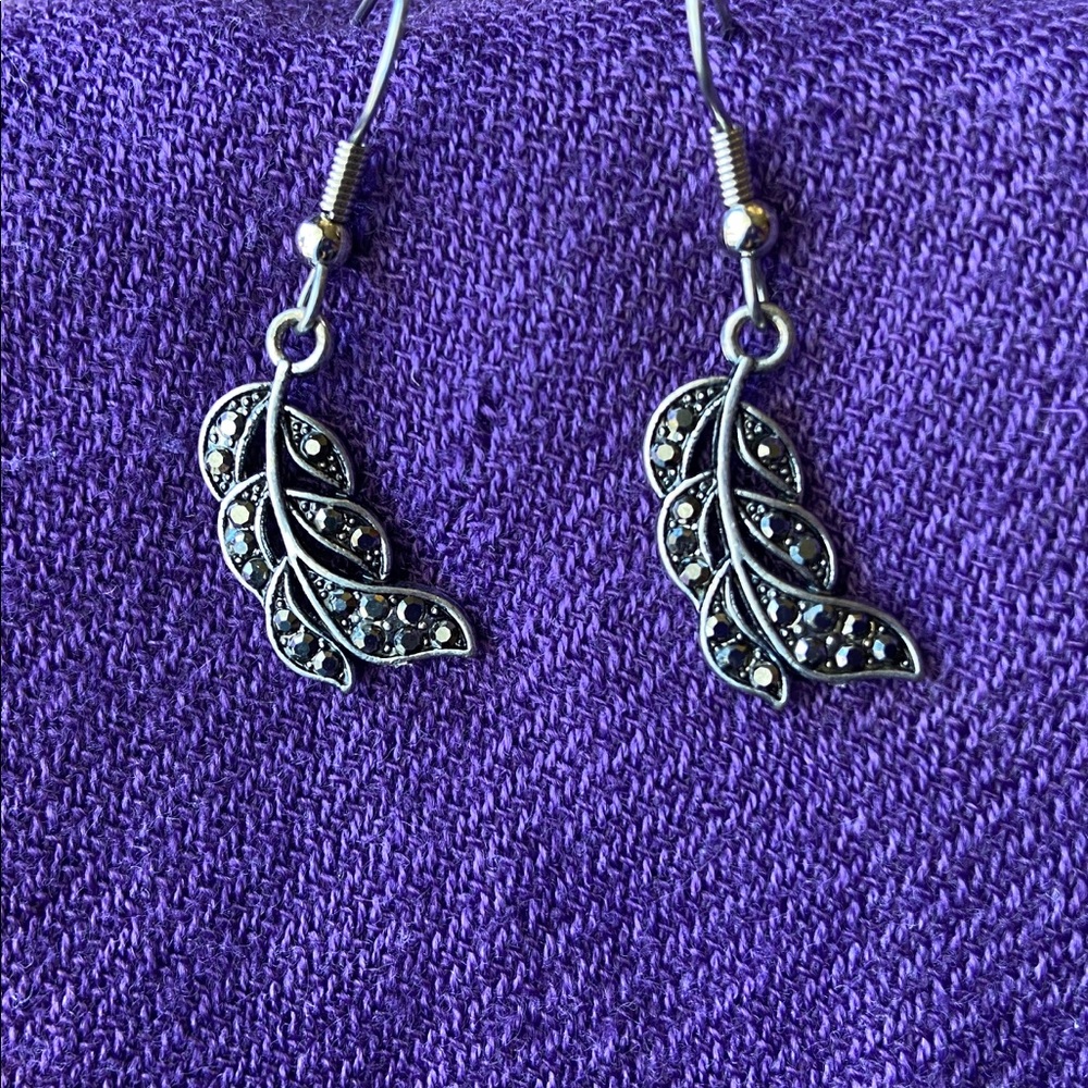 Black crystal encrusted feather earring